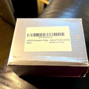 A new Antique Tin Color small Chest and lined with velvet. Boxed. Great Gift